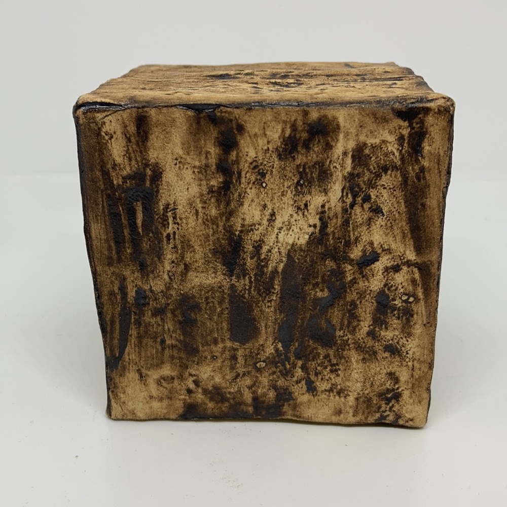 Artisan signed pottery rattle. About 3.5” cubic